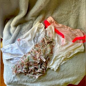 Lot of 4 Victoria’s Secret size Medium panties